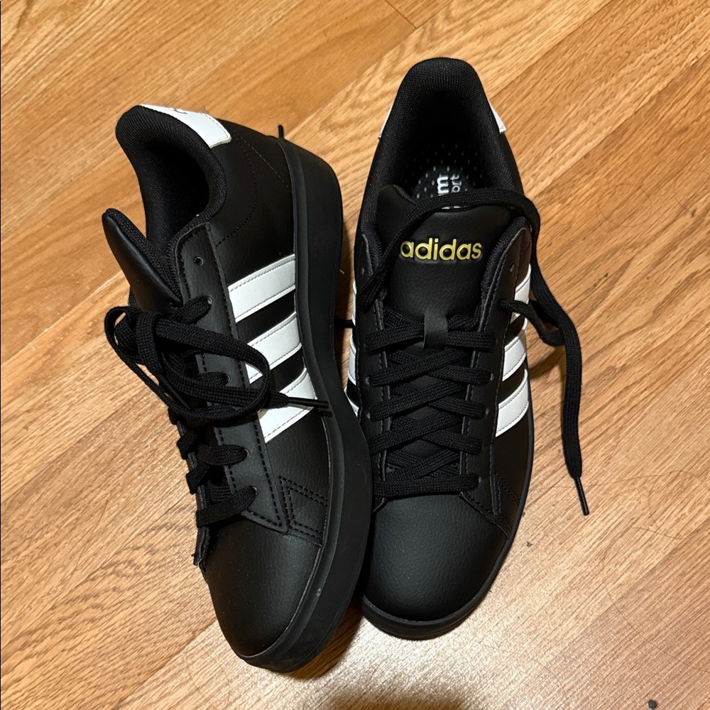Adidas Black Sneakers with White Stripes